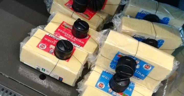 Discount grocer Aldi is securing .80 blocks of cheese in plastic security cages to deter shoplifting amid cost-of-living crisis Discount grocer Aldi is securing .80 blocks of cheese in plastic security cages to deter shoplifting amid cost-of-living crisis